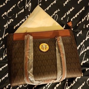 NWT Marco M Kelly